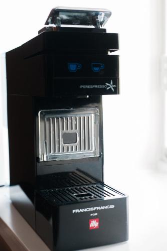 a toaster oven in a black box on a counter at Hanze Hotel Zwolle in Zwolle