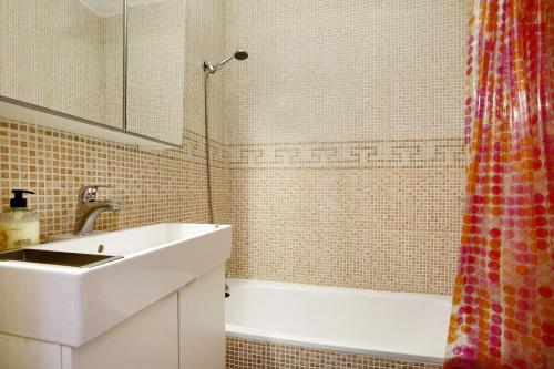 a bathroom with a sink and a tub and a shower at Casa Raquel 1 in Costa de Antigua