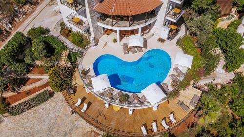 an overhead view of a building with a swimming pool at Hill House Adult Only in Kas