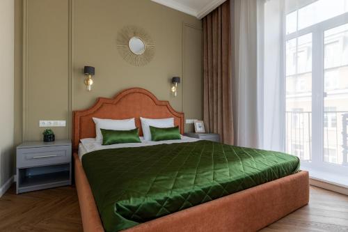 Кровать или кровати в номере Дом Дехтерева