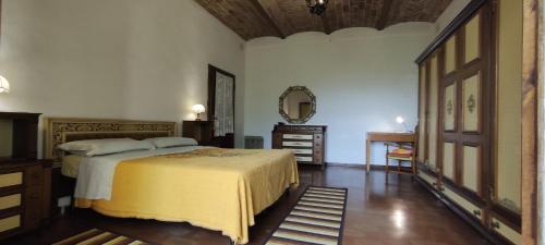 מיטה או מיטות בחדר ב-Santa Caterina Bed and Breakfast