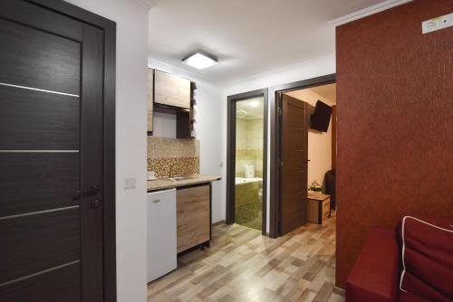 Kuchyň nebo kuchyňský kout v ubytování Venus hotel