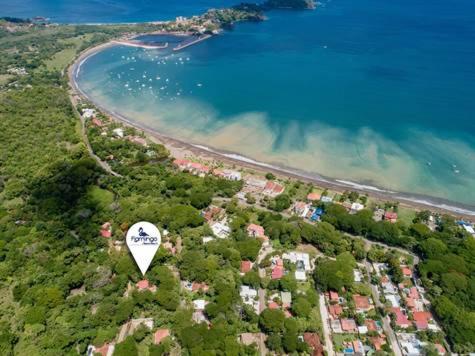 an aerial view of a resort with a beach at Casa Melosa in Potrero