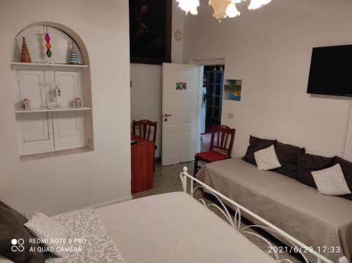 Letto o letti in una camera di ENZA ROOM'S AMALFI COAST affittacamere