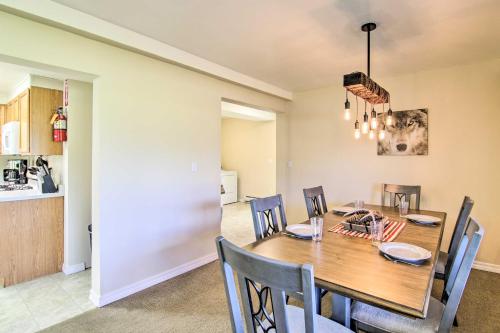a dining room and kitchen with a table and chairs at Montanas Emigrant Peaks Getaway Apt with Mtn Views in Emigrant