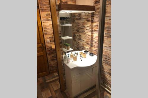 Bilik mandi di Appartement familial de caractère