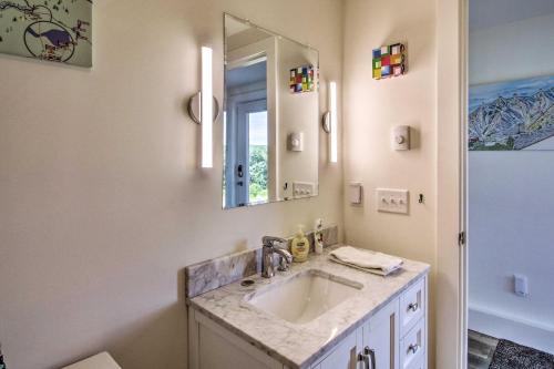 a bathroom with a sink and a mirror at Cozy Bethel Escape with Views Less Than 10 Mi to Ski! in Bethel