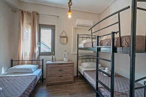 Una cama o camas en una habitación de Casa Sofia Apt#2, By Hellocrete