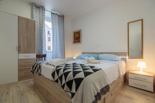 מיטה או מיטות בחדר ב-Apartment Eša