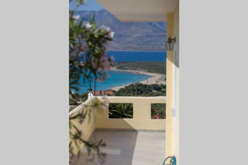 a view of the ocean from the balcony of a house at Elafonisos Amazing View in Elafonisos