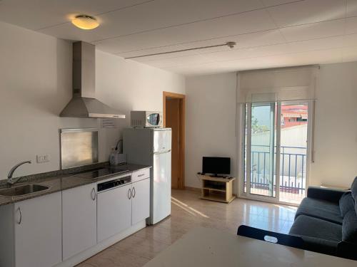 Kuchyňa alebo kuchynka v ubytovaní Aparthotel Iris