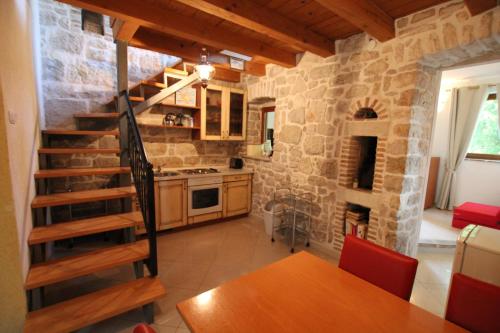 Kuchyň nebo kuchyňský kout v ubytování Cottage Sammon