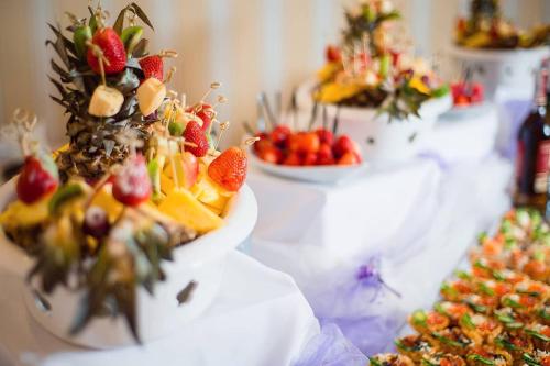 a group of bowls of fruit on a table at Delta Hotel in Vylkove