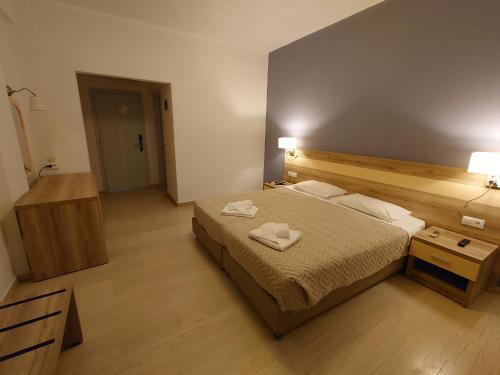 Cama o camas de una habitación en Ifigenia Hotel