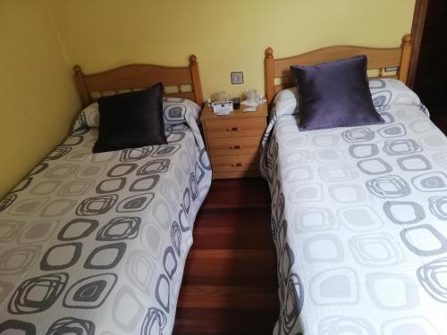 Ein Bett oder Betten in einem Zimmer der Unterkunft Pensión Rosa