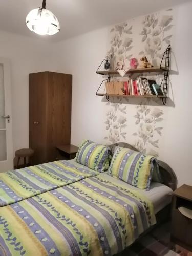 Postel nebo postele na pokoji v ubytování Siófok Aranypart 2