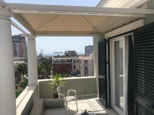 a balcony with a view of the city at Amfiteatri Boutique Hotel in Durrës
