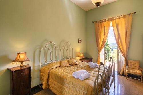 Ένα ή περισσότερα κρεβάτια σε δωμάτιο στο Villa Rignano by Mmega