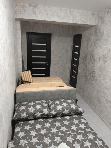 Voodi või voodid majutusasutuse Уютные апартаменты в Одесском дворике toas