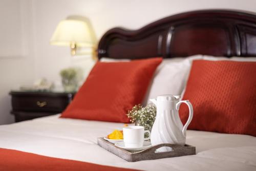 Una cama o camas en una habitación de Hotel Cordero