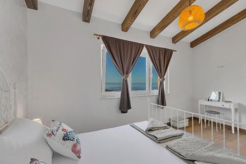 Ένα ή περισσότερα κρεβάτια σε δωμάτιο στο NEW! Milan's House with pool, Mediterranean