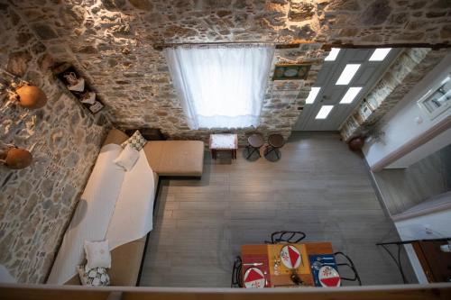 an overhead view of a room with a window at Oneiro Cottage in Skopelos Town