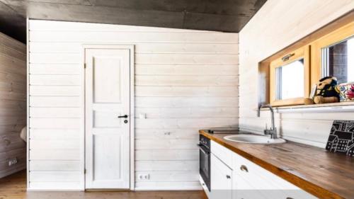 Kuchyň nebo kuchyňský kout v ubytování Spithami Seaside Wooden Chalet