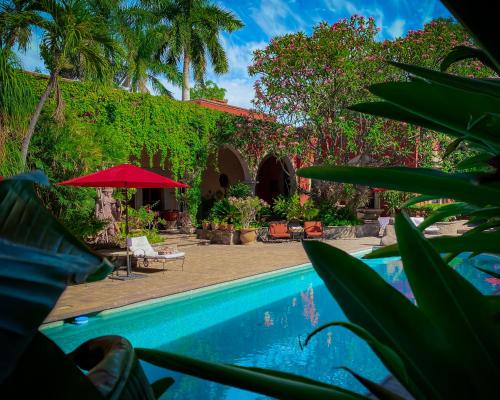Der Swimmingpool an oder in der Nähe von Hacienda de los Santos