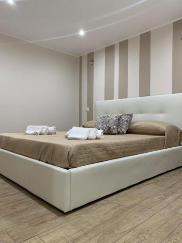 A bed or beds in a room at Case vacanza Sole e Luna