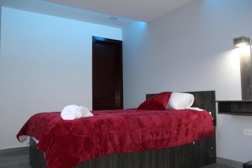 Ένα ή περισσότερα κρεβάτια σε δωμάτιο στο El Vergel Norte