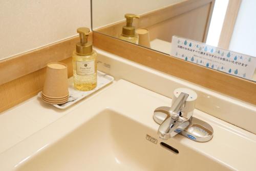 Nakanoyu Onsen Ryokan tesisinde bir banyo