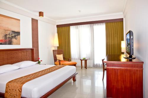 Ένα ή περισσότερα κρεβάτια σε δωμάτιο στο The Rani Hotel & Spa