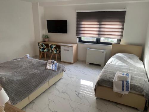 Postel nebo postele na pokoji v ubytování Belamionix motel