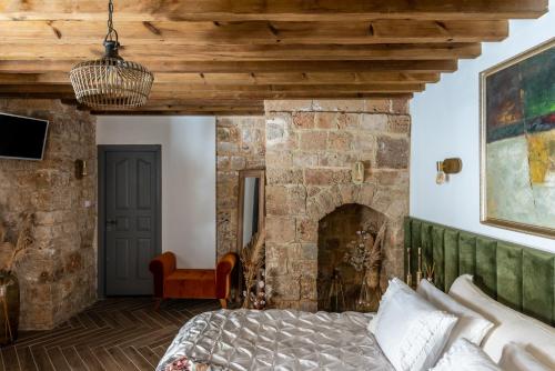 Postel nebo postele na pokoji v ubytování Two Wells Zimmer Suite