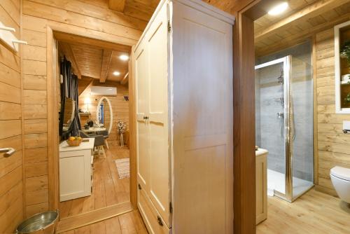 a bathroom with a toilet and a sink at Lakeside Hotel Plitvice in Plitvička Jezera