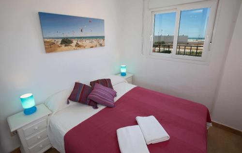 Krevet ili kreveti u jedinici u objektu Tarifa Beach Rentals Aljara