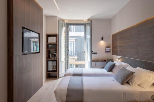 Ліжко або ліжка в номері Aiello Hotels - Centrale