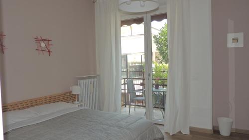 Katil atau katil-katil dalam bilik di Appa49 vicino Ospedale Borgo Roma, Fiera e Univr