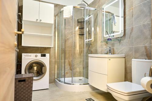 Koupelna v ubytování Sunset view Apartment- Spa Pools Resort