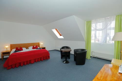 Una cama o camas en una habitación de Hotel Magnolia