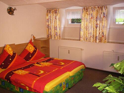 Ein Bett oder Betten in einem Zimmer der Unterkunft Schillergewölbe - Im Herzen von Zittau