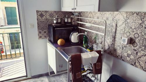Kuchyň nebo kuchyňský kout v ubytování Corfu cosy apartment at Kerkira