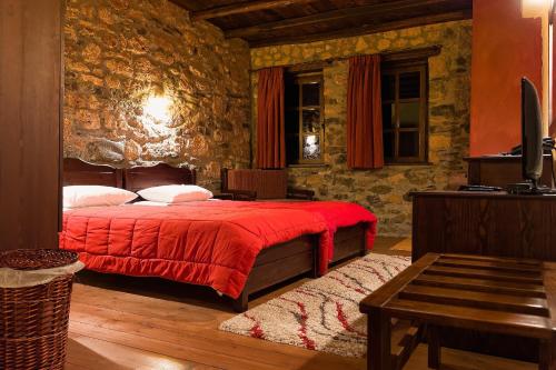 Ένα ή περισσότερα κρεβάτια σε δωμάτιο στο Villa Vadola