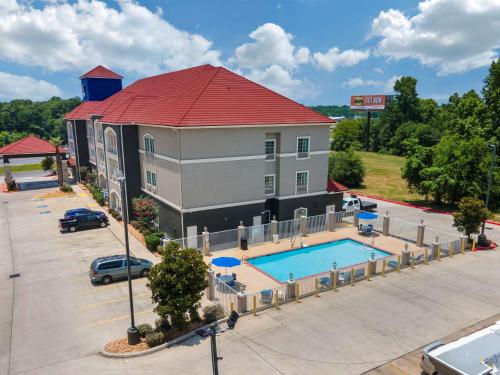 an aerial view of a hotel with a swimming pool at Comfort Inn & Suites in Cleveland