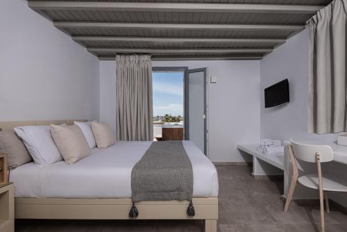 Postel nebo postele na pokoji v ubytování Argo Boutique Hotel