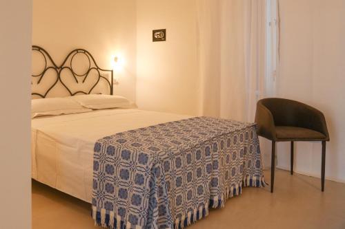 Cama o camas de una habitación en CORTE LARGO LAURO DIMORE & SPA