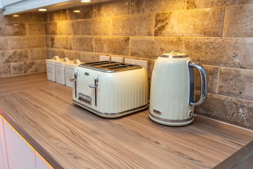 Set per la preparazione di tè e caffè presso Optimal Apartments