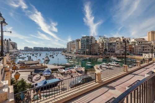 a view of a marina with boats in the water at The G Hotel by JL in St Julian's