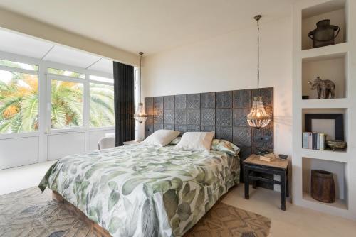 Ένα ή περισσότερα κρεβάτια σε δωμάτιο στο Casa Boa