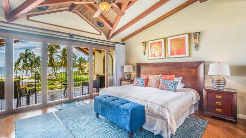 Un ou plusieurs lits dans un hébergement de l'établissement The Palms 2-Bedroom Luxury villa on the Beach